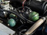 a close up of a car ' s engine with its hood open
