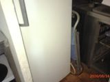 an image of a kitchen with a refrigerator and a dishwasher