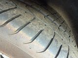 a close up view of a tire on a vehicle
