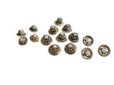 a close up of a bunch of buttons on a white surface