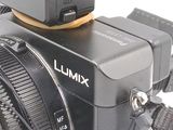 a close up of a camera with a lens attached to it