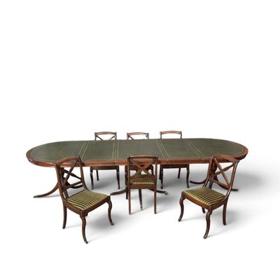 une photo représentant une table à manger avec six chaises et une grande table ovale
