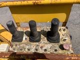 a close up of a piece of machinery that is sitting on the ground