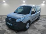 the silver van is parked in a large room with checkered flooring