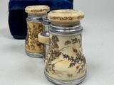 three glass jars that have different designs on them