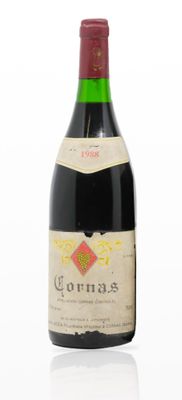 a bottle of wine that is sitting on a table