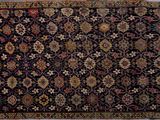 tapis persan antique à motif floral sur fond noir