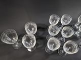 a lot of empty wine glasses sitting on a table