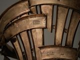 a close up of a chair made out of metal