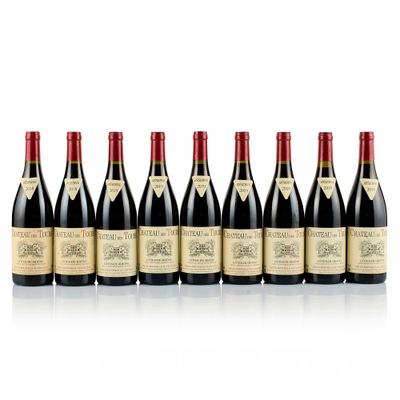 six bottles of red wine lined up in a row