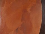 an oil painting of a woman in a brown dress with a black background