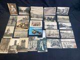 several old black and white photographs of buildings and boats on a table