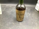 a bottle of liquor sitting on a counter in a store