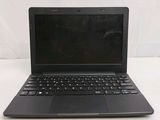 a black laptop computer sitting on a white surface