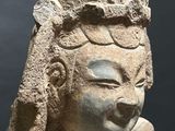 an image of a statue of a woman with a bird on her shoulder