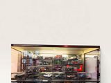 a display case with a lot of toys inside of it