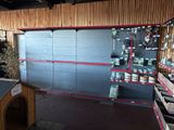 a garage with a lot of items on the shelves