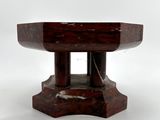 a small table with a wooden base on a white background