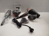 a hair dryer, a blow dryer, and other items on a table