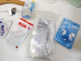 many items that are sitting on a white table