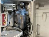 a cooler that has a bunch of items inside of it