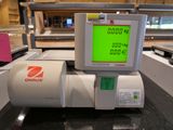 a machine that has a green screen on top of it