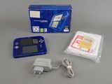 a nintendo wii game console with a charger and a charger
