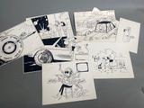 a lot of drawings on the table of a car