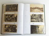 an open book with pictures on it on a table