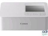 un gros plan d'une imprimante photo Canon sur fond blanc