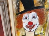 a painting of a clown with a top hat on