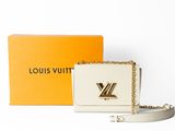 Petit sac à rabat Louis Vuitton en cuir blanc et doré