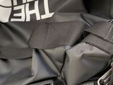 a close up of a bag with a carabine in it