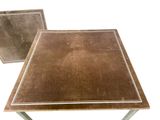 two tables that are sitting side by side on a white background