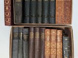 a lot of books in a box on the table