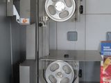 a machine that is sitting on the counter in the kitchen