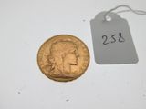 a close up of a coin with a price tag on it