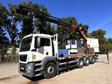 a large truck with a crane on the back of it