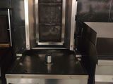 an image of a commercial kitchen with stainless steel appliances