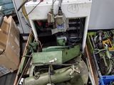 a box full of assorted machinery in a room