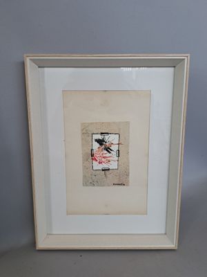 une photo d'une photo d'un oiseau dans un cadre photo