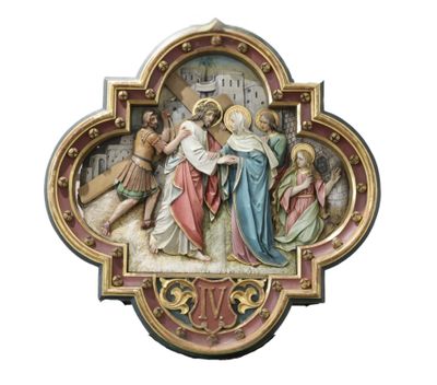 une image représentant une plaque religieuse sur laquelle figure Jésus portant la croix