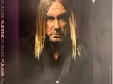 L'affiche d'Iggy Pop représente un homme aux cheveux longs et à la barbe fournie
