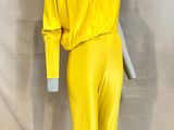 a mannequin wearing a yellow jumpsuit on a mannequin mannequin mannequin mann