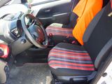 a small car with two seats and a steering wheel