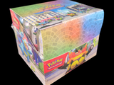 a box of pokemon trading cards sitting on top of a table
