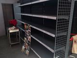 many empty shelves in a store that are empty