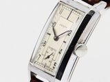an image of a wrist watch with a brown leather band