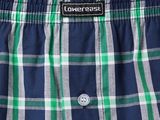 a close up of a man ' s underwear with a green and blue checkered pattern