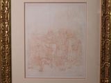 une vieille photo représentant un dessin dans un cadre doré accroché au mur